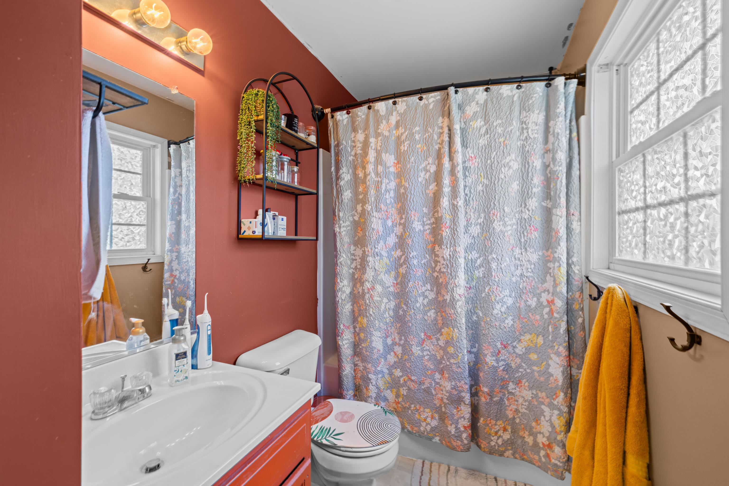 1520 3rd Street Waynesboro, VA 22980 - Photo 25 of 55 a bathroom with a sink toilet and shower curtain