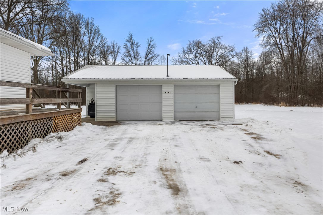 6161 Shaffer Road Northwest Warren, OH 44481 - Photo 3 of 20 View of snow covered garage