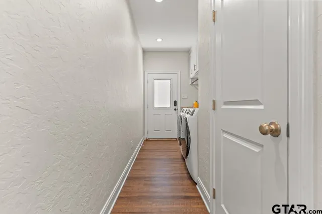 a utility room with dryer and washer
