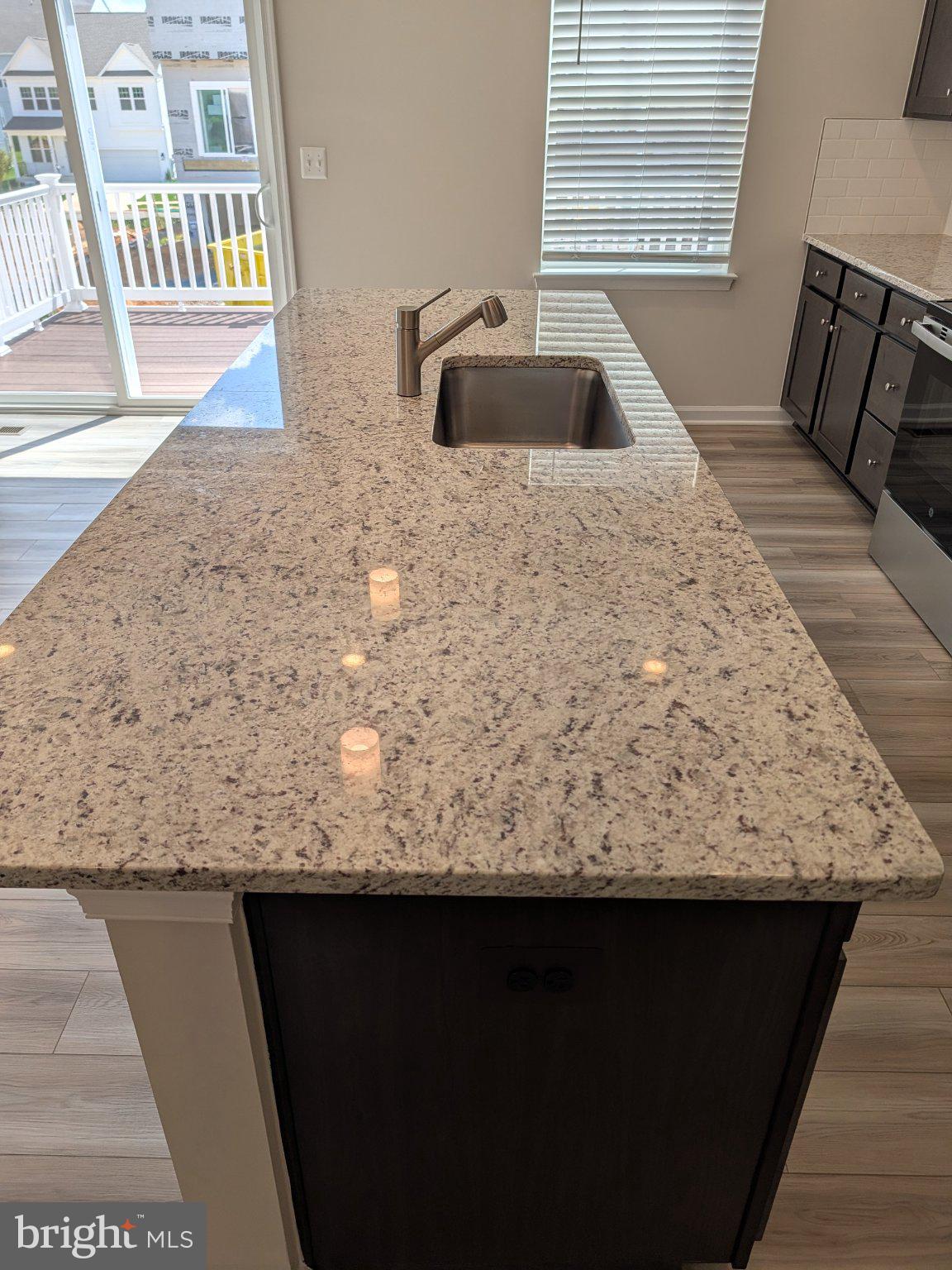 278 Swan Fld Avenue Ranson, WV 25438 - Photo 10 of 33 Sleek granite countertop elegance.