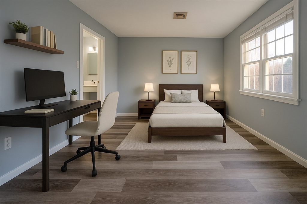 43 Patrick Road, Unit 43 Tewksbury, MA 01876 - Photo 26 of 27 a bedroom with a bed and a desk