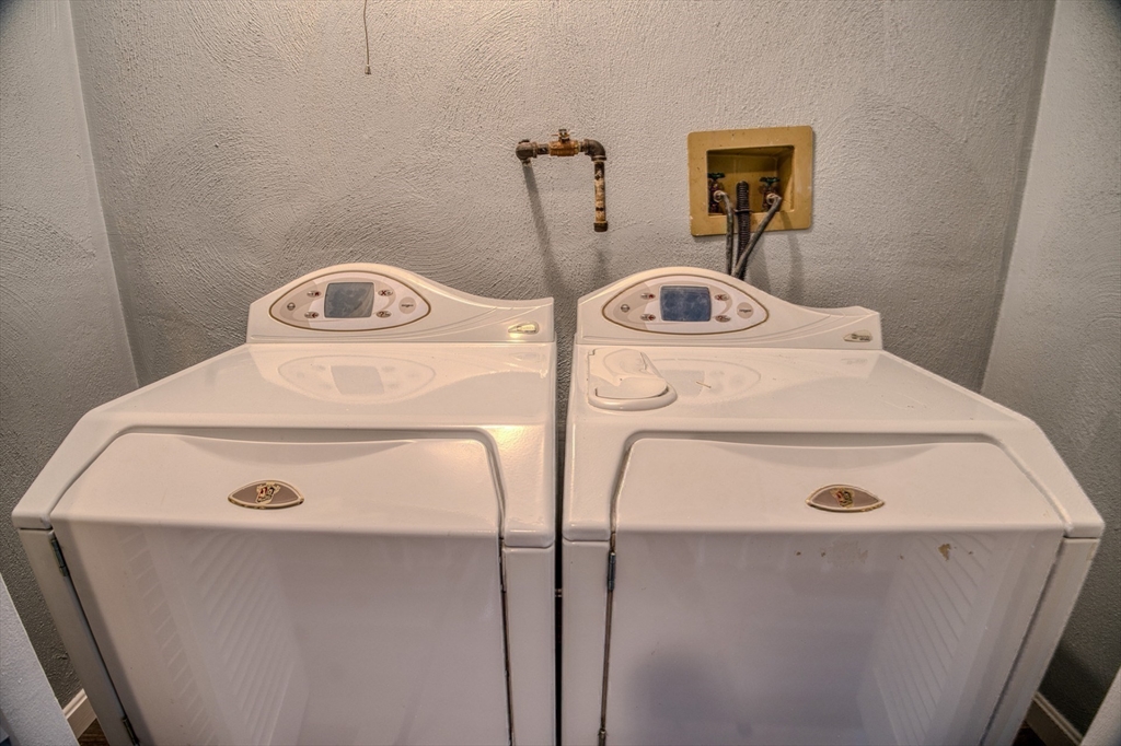 43 Patrick Road, Unit 43 Tewksbury, MA 01876 - Photo 27 of 27 a utility room with dryer and washer