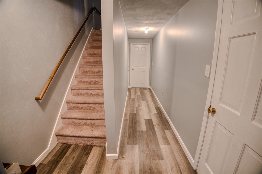 43 Patrick Road, Unit 43 Tewksbury, MA 01876 - Photo 5 of 27 a view of a staircase