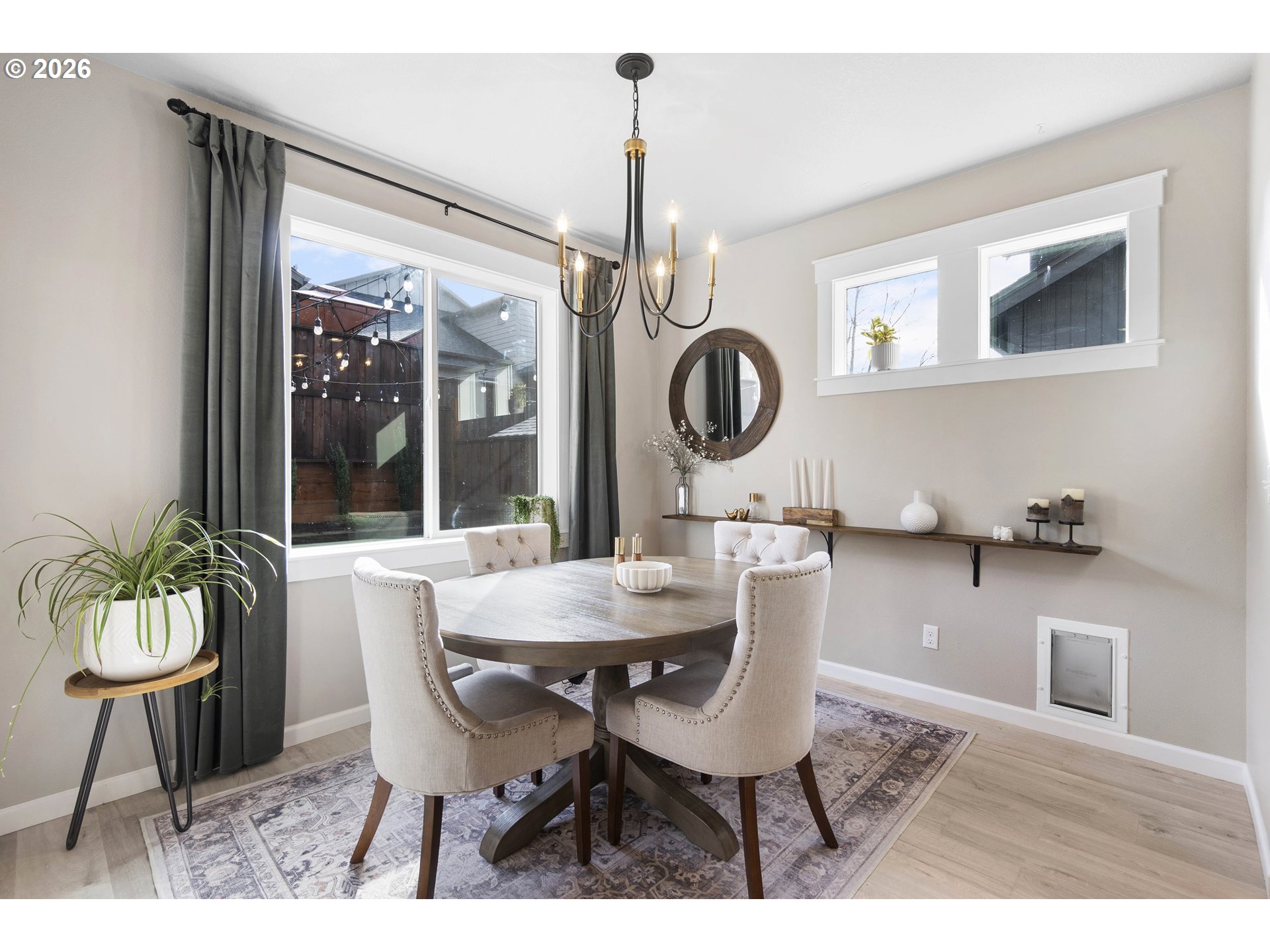 15520 Rainier Avenue Sandy, OR 97055 - Photo 15 of 38 a dining room with furniture window and wooden floor