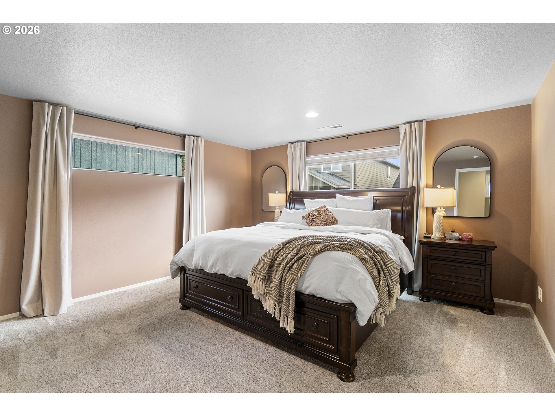 15520 Rainier Avenue Sandy, OR 97055 - Photo 18 of 38 a bed room with a bed and a dresser