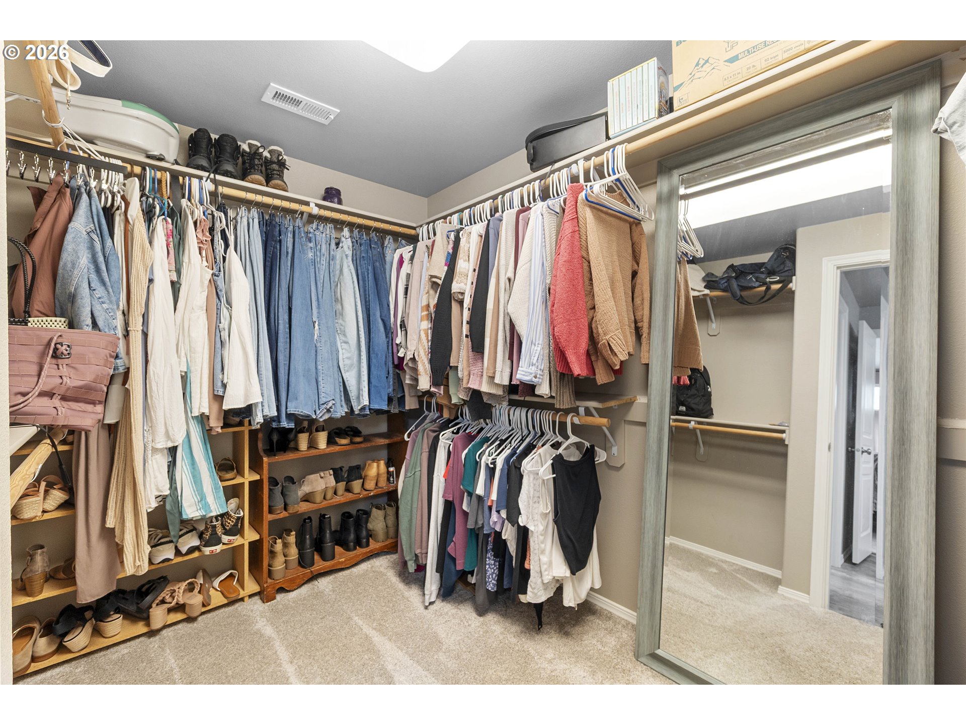 15520 Rainier Avenue Sandy, OR 97055 - Photo 19 of 38 a view of walk in closet with clothes