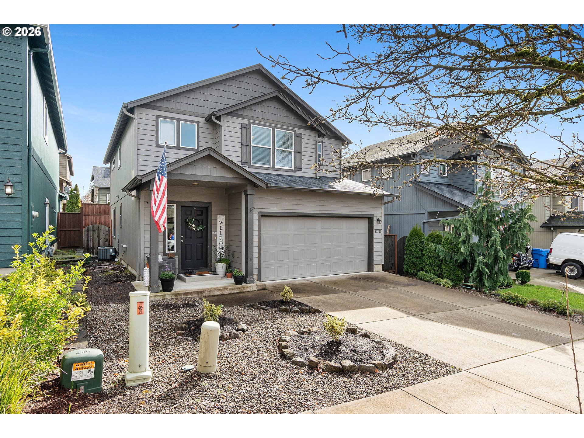 15520 Rainier Avenue Sandy, OR 97055 - Photo 2 of 38 a front view of a house with a yard