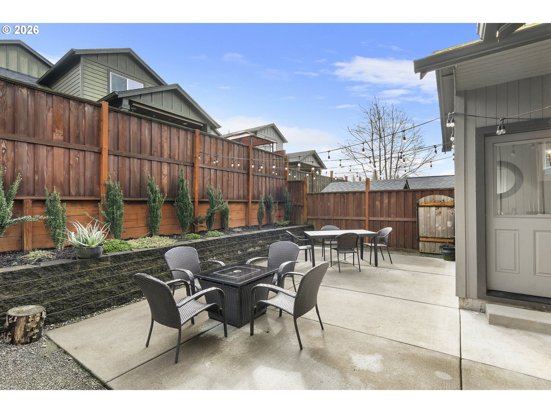 15520 Rainier Avenue Sandy, OR 97055 - Photo 28 of 38 a view of a patio with a table and chairs