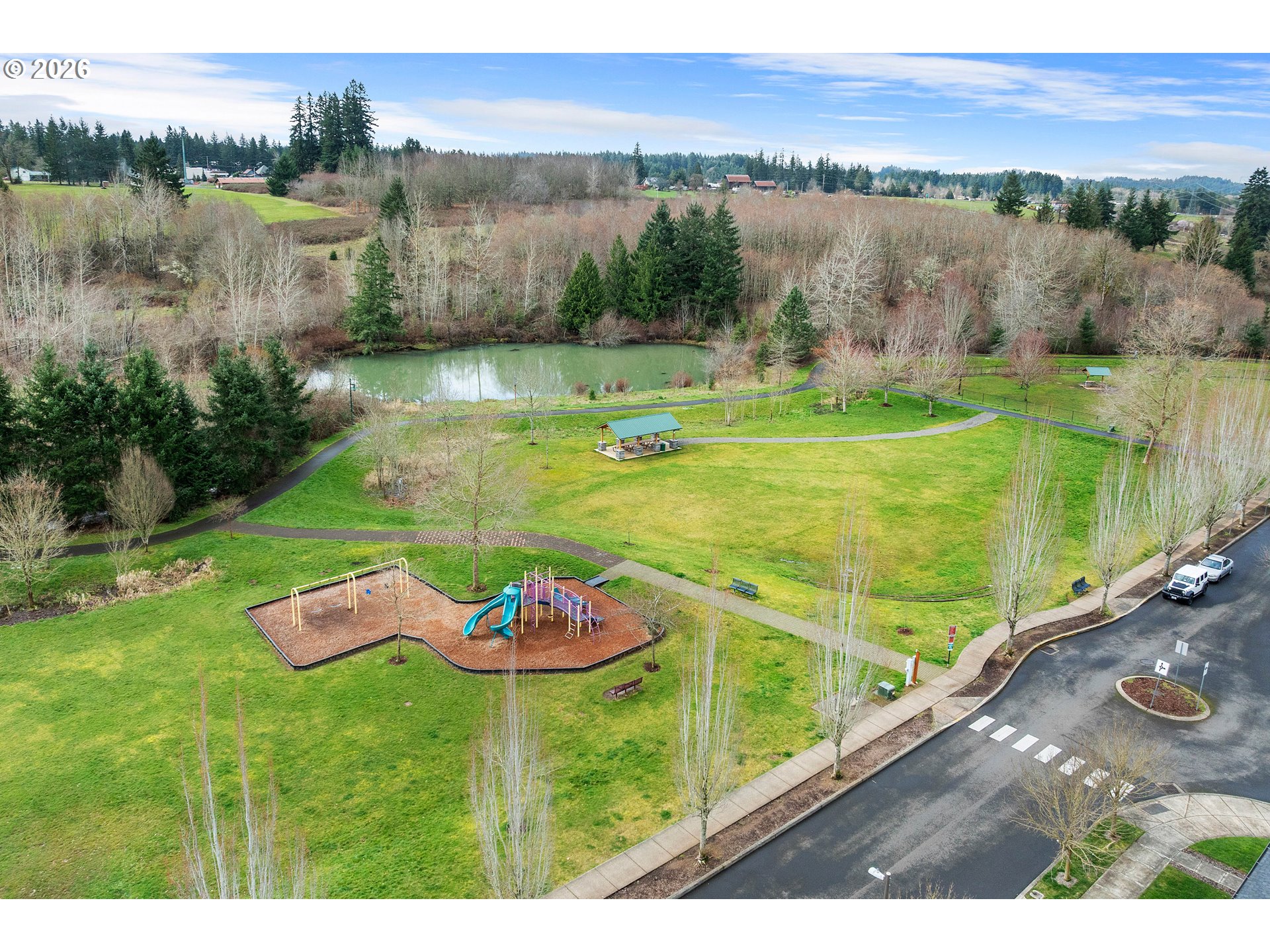 15520 Rainier Avenue Sandy, OR 97055 - Photo 33 of 38 a view of a lake with a big yard