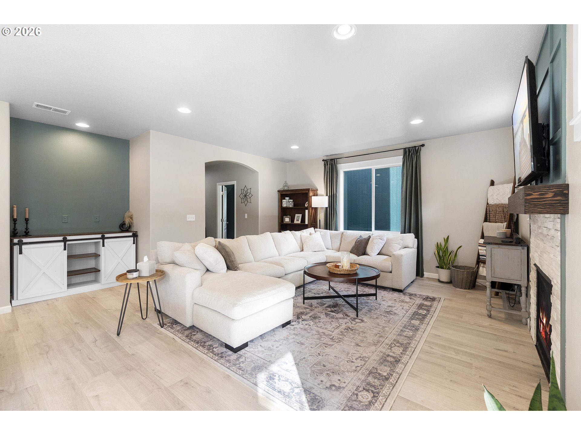 15520 Rainier Avenue Sandy, OR 97055 - Photo 8 of 38 a living room with furniture and a flat screen tv