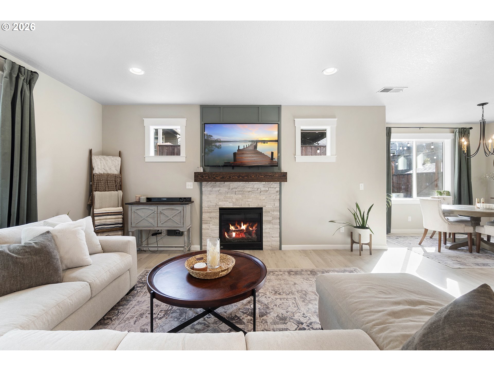 15520 Rainier Avenue Sandy, OR 97055 - Photo 10 of 38 a living room with furniture and a fireplace