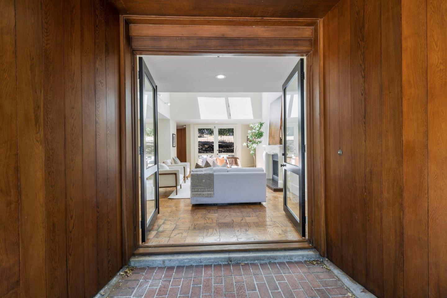 3364 Woodside Road Woodside, CA 94062 - Photo 12 of 48 a view of dining room with wooden floor and furniture