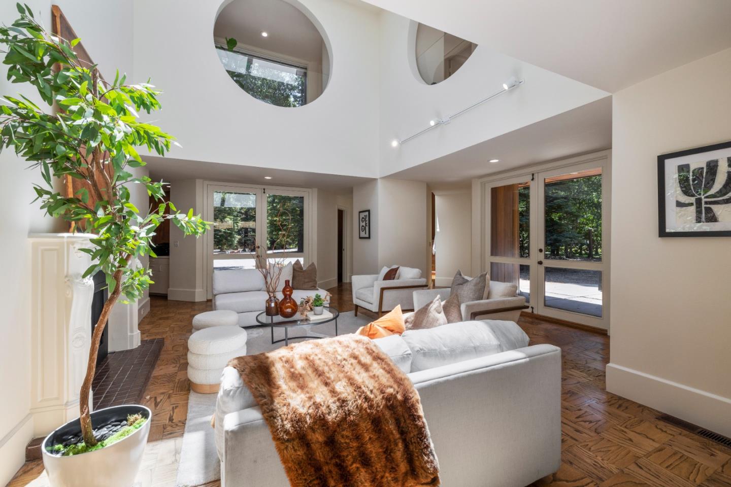 3364 Woodside Road Woodside, CA 94062 - Photo 17 of 48 a living room with furniture and a potted plant