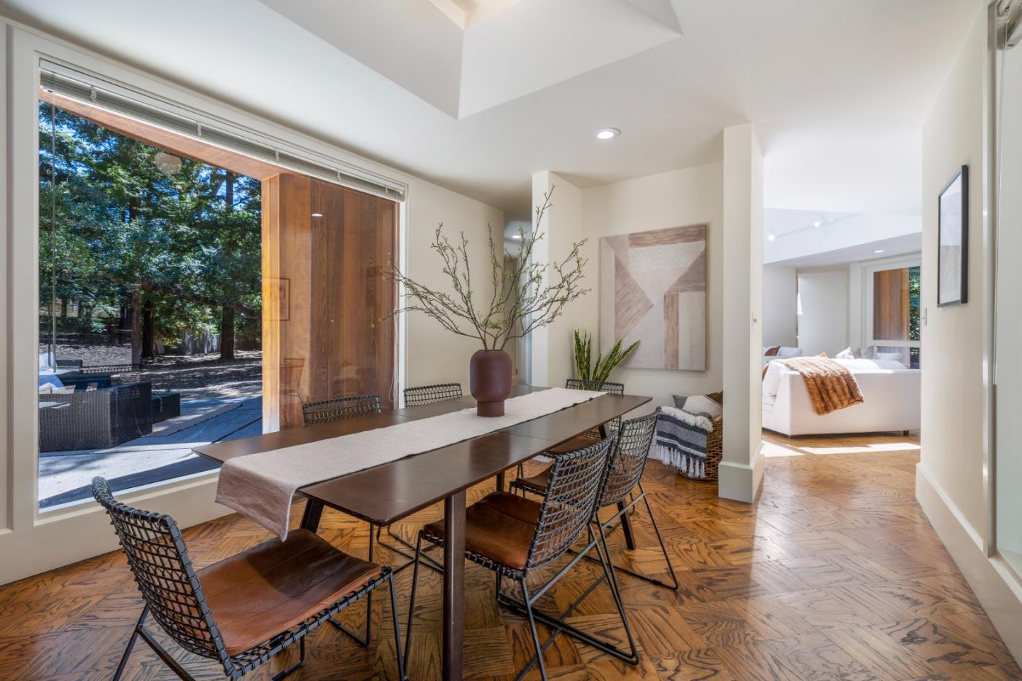 3364 Woodside Road Woodside, CA 94062 - Photo 24 of 48 a dining room with furniture and a floor to ceiling window