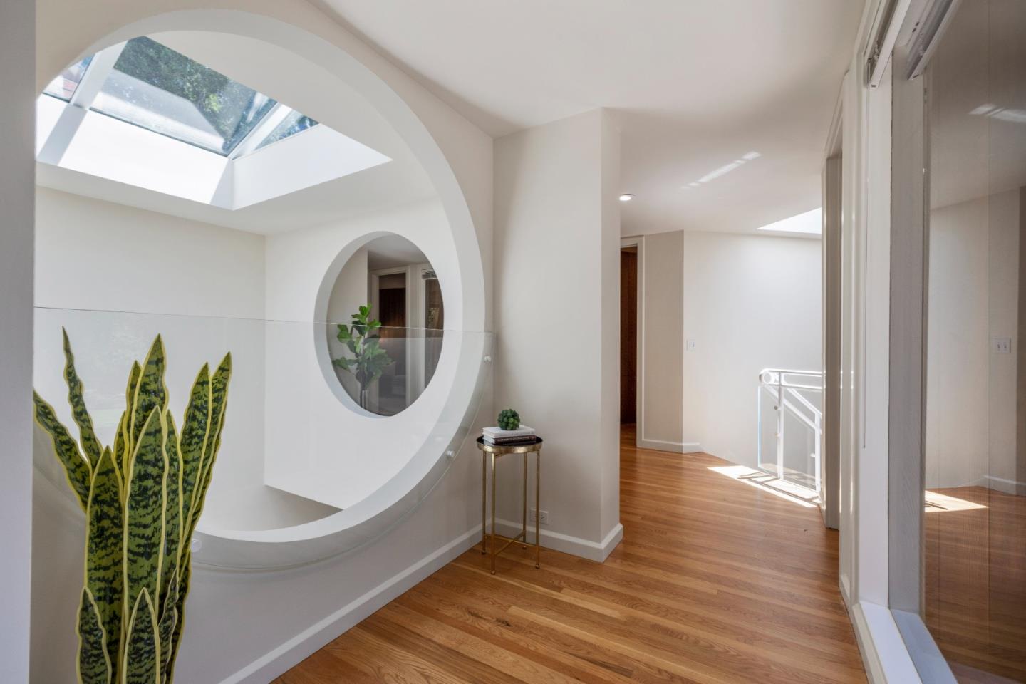 3364 Woodside Road Woodside, CA 94062 - Photo 26 of 48 a view of a hallway with entryway wooden floor and front door