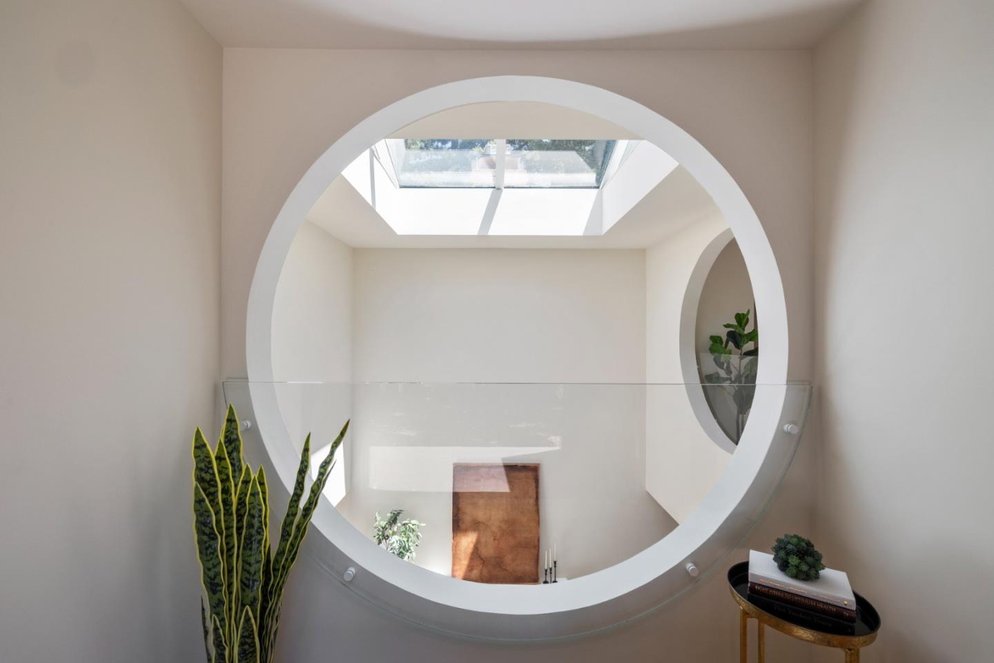 3364 Woodside Road Woodside, CA 94062 - Photo 27 of 48 an entryway with wooden floor and a potted plant