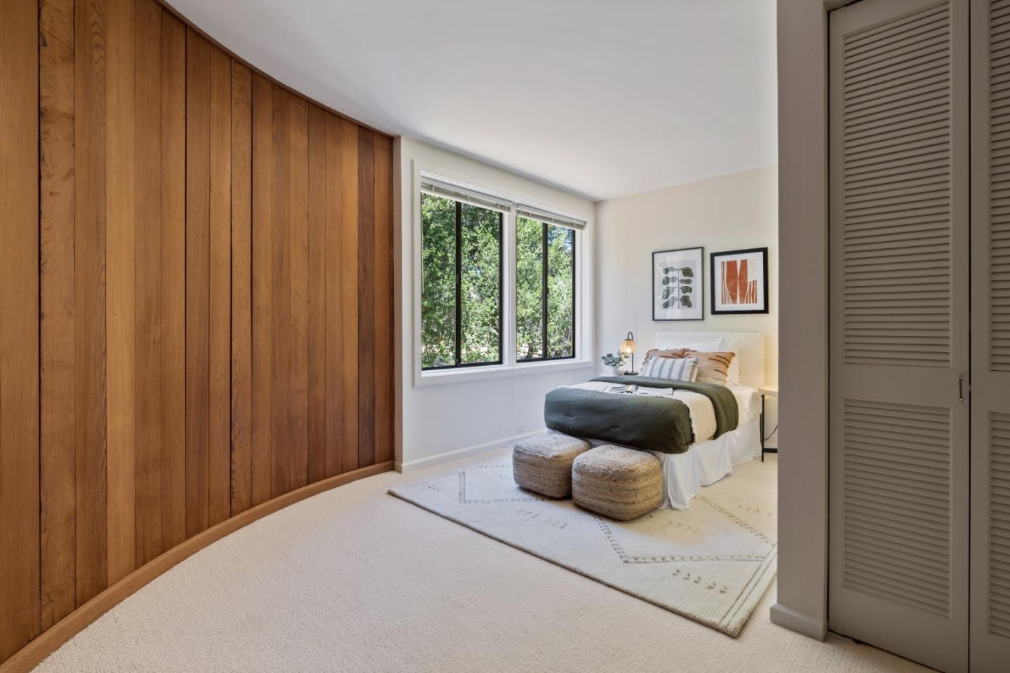 3364 Woodside Road Woodside, CA 94062 - Photo 33 of 48 a bedroom with a bed and a window