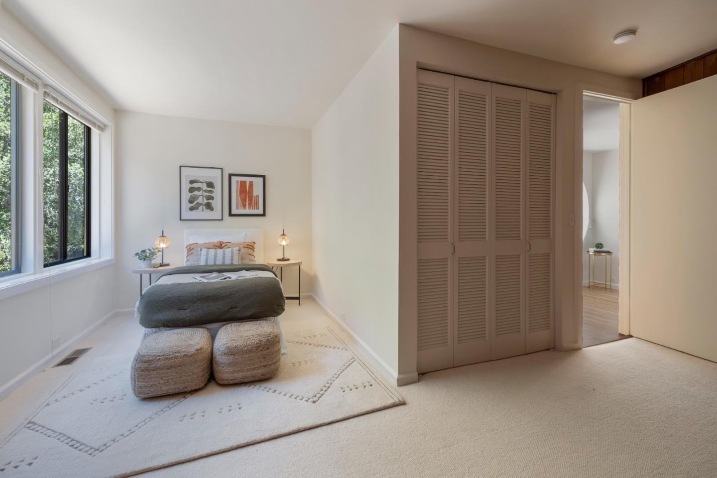 3364 Woodside Road Woodside, CA 94062 - Photo 34 of 48 a bedroom with a bed and a window