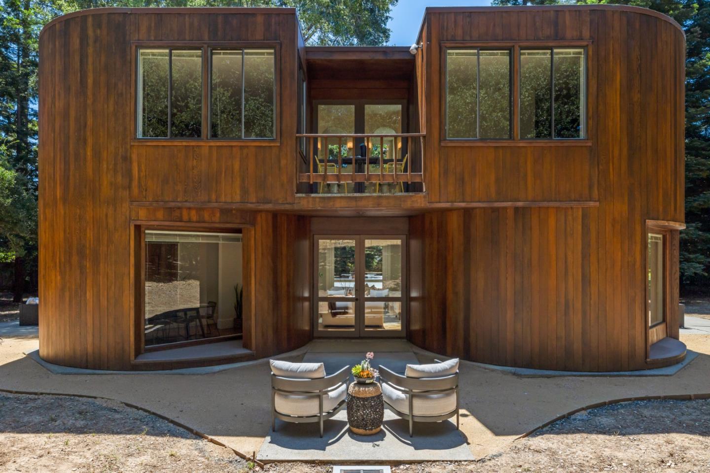 3364 Woodside Road Woodside, CA 94062 - Photo 10 of 48 a view of a porch with a table and chairs