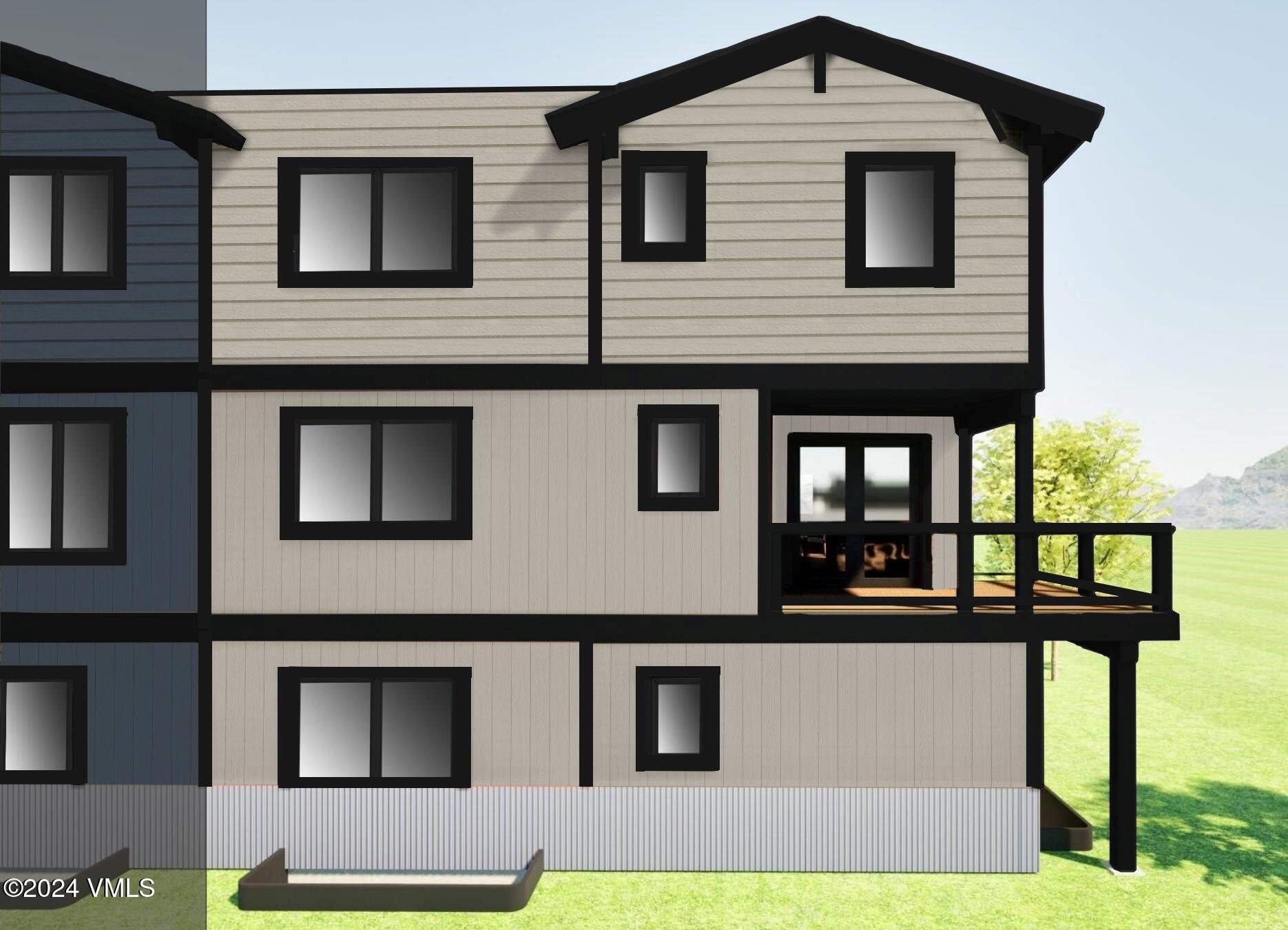 25 Belden Way Minturn, CO 81645 - Photo 3 of 13 a front view of a house with a yard