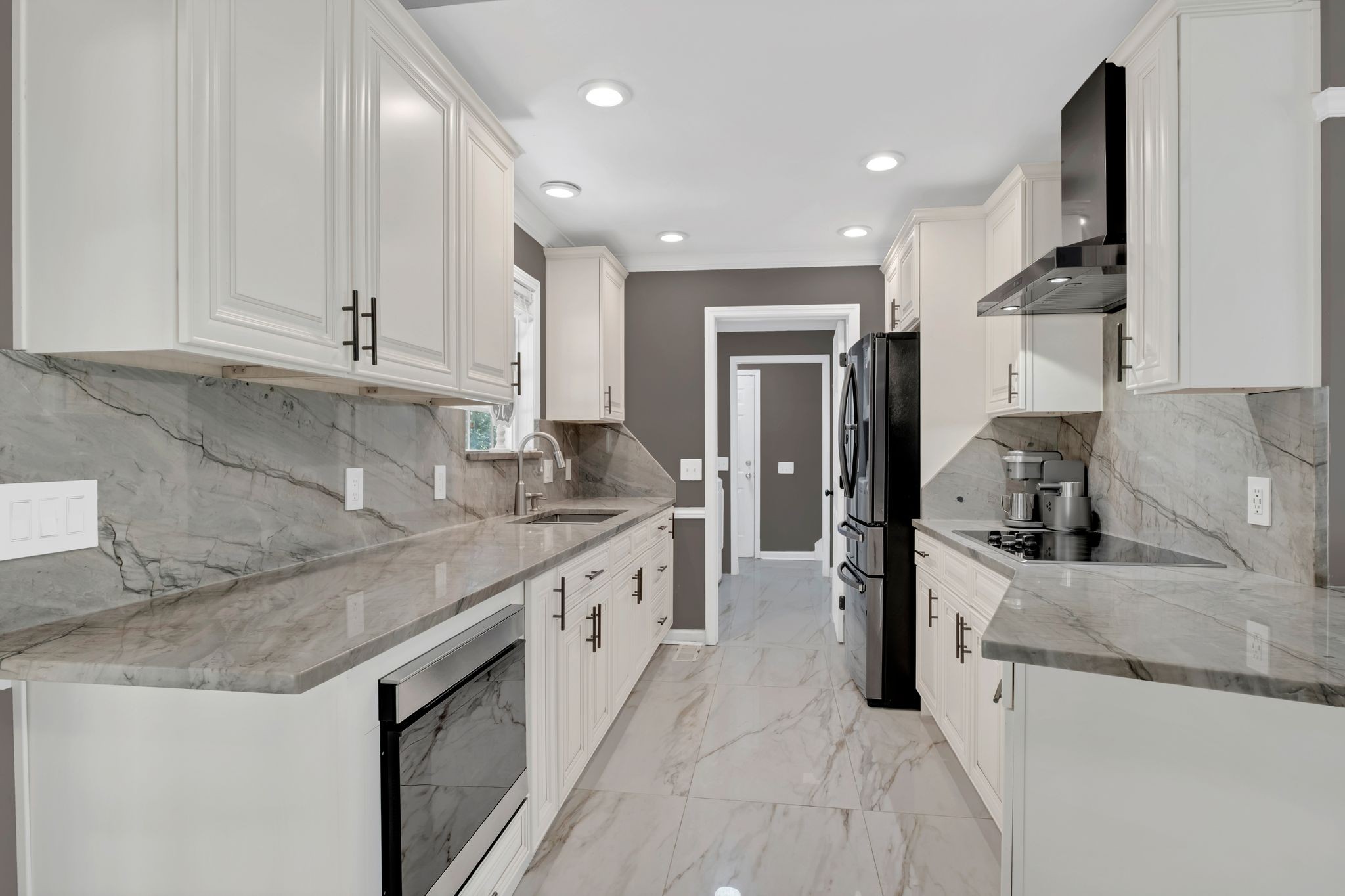 532 Windy Road Mount Juliet, TN 37122 - Photo 12 of 35 a kitchen with stainless steel appliances granite countertop a sink stove and refrigerator