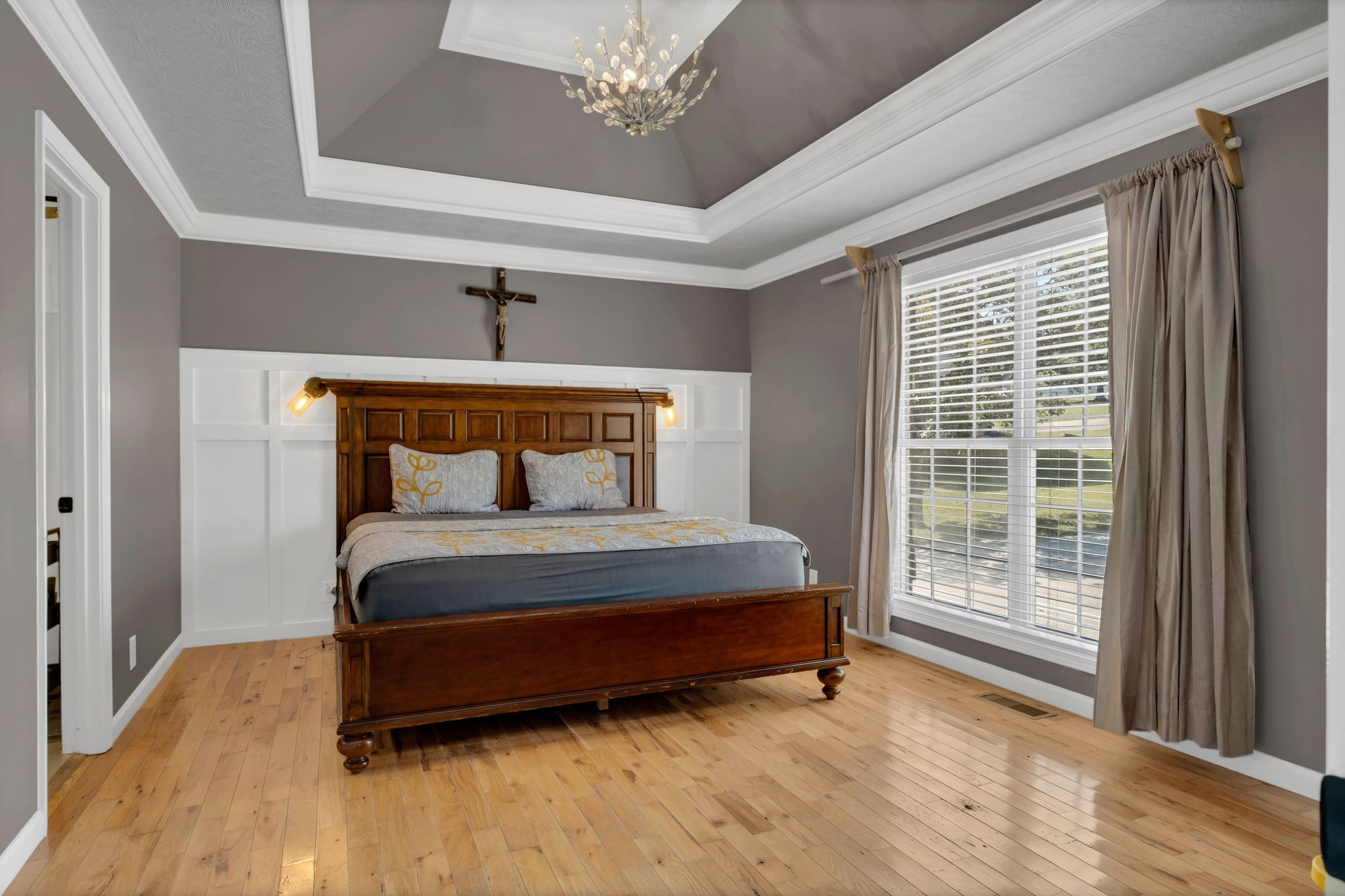 532 Windy Road Mount Juliet, TN 37122 - Photo 17 of 35 a bedroom with a bed wooden floor and window