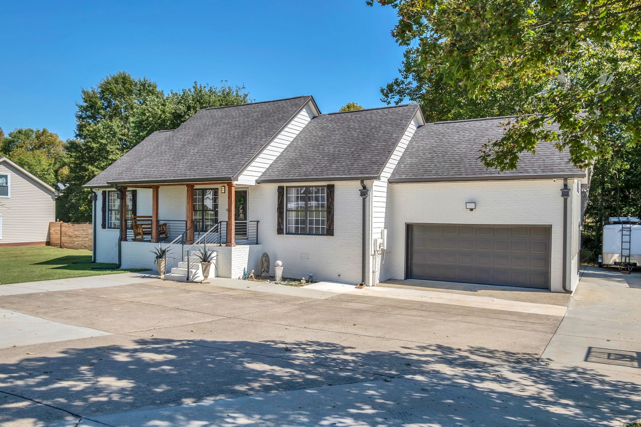 532 Windy Road Mount Juliet, TN 37122 - Photo 2 of 35 a front view of a house with a yard and garage