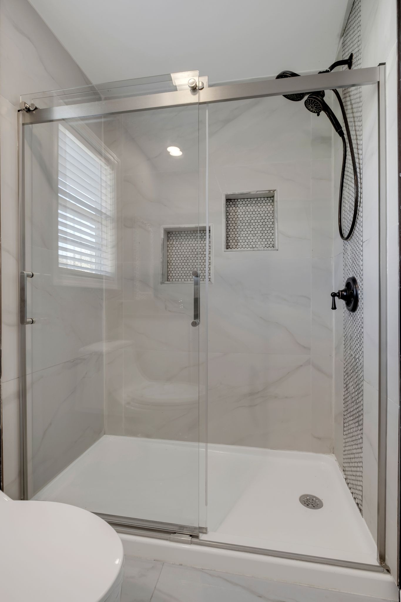532 Windy Road Mount Juliet, TN 37122 - Photo 24 of 35 a bathroom that has a glass shower door