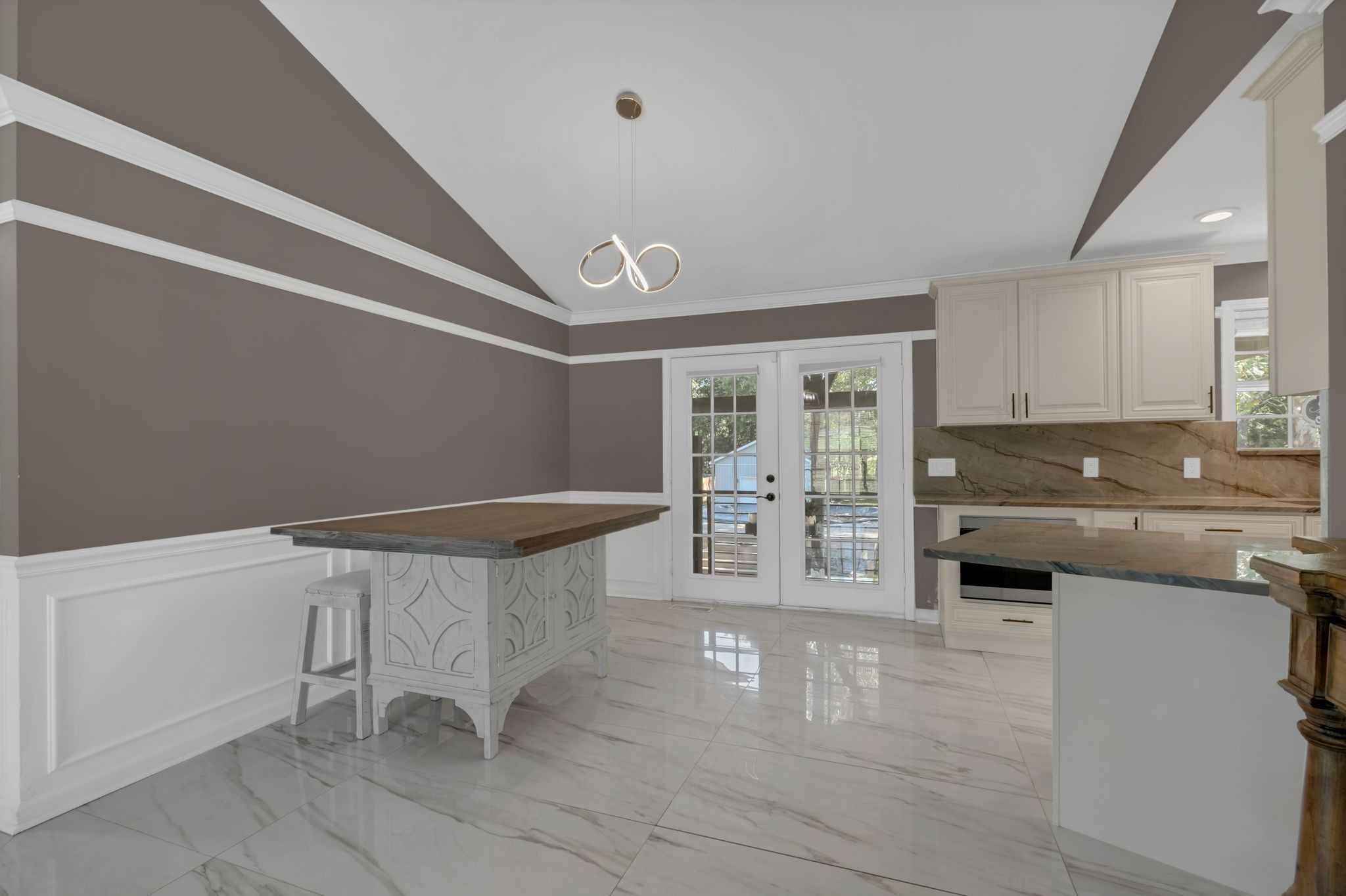 532 Windy Road Mount Juliet, TN 37122 - Photo 10 of 35 a kitchen with granite countertop a stove and cabinets
