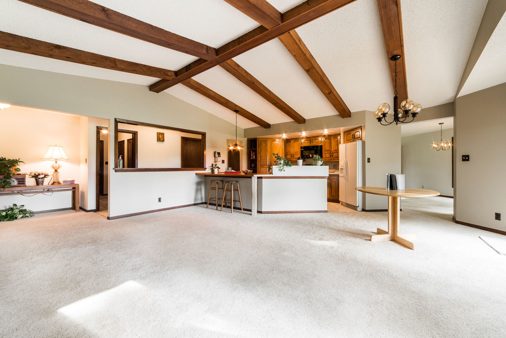 16045 Whipple Road Sycamore, IL 60178 - Photo 12 of 60 a view of a livingroom with furniture and a floor to ceiling window