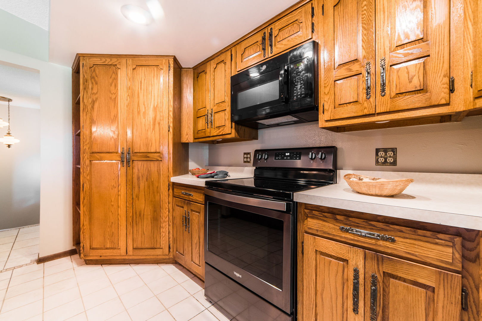 16045 Whipple Road Sycamore, IL 60178 - Photo 17 of 60 a kitchen with stainless steel appliances granite countertop a stove microwave and refrigerator