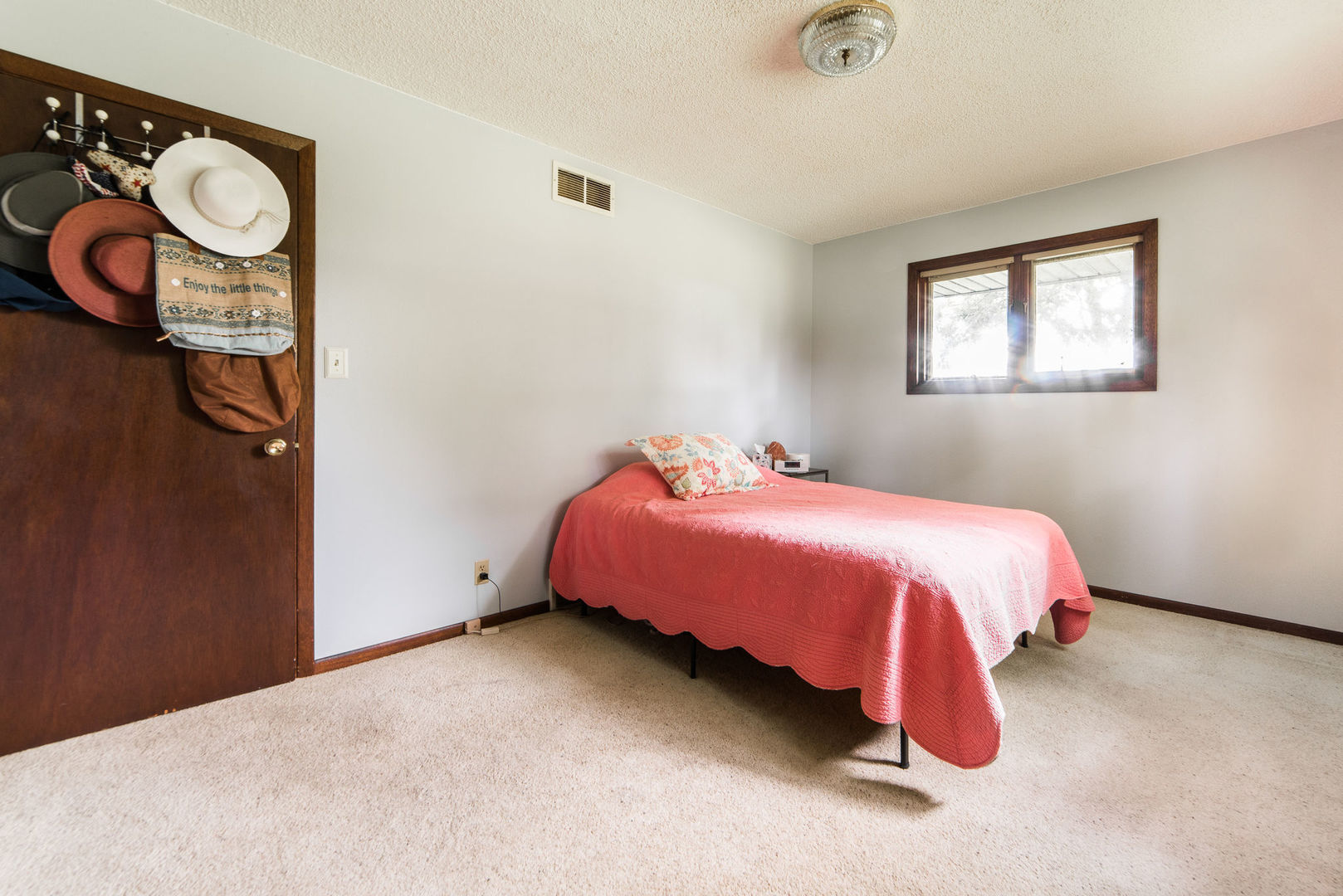 16045 Whipple Road Sycamore, IL 60178 - Photo 26 of 60 a bedroom with a bed and cabinets