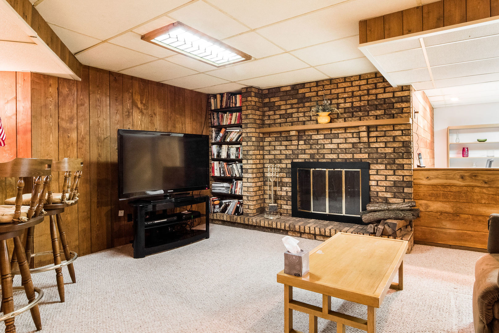 16045 Whipple Road Sycamore, IL 60178 - Photo 32 of 60 a living room with furniture and a flat screen tv