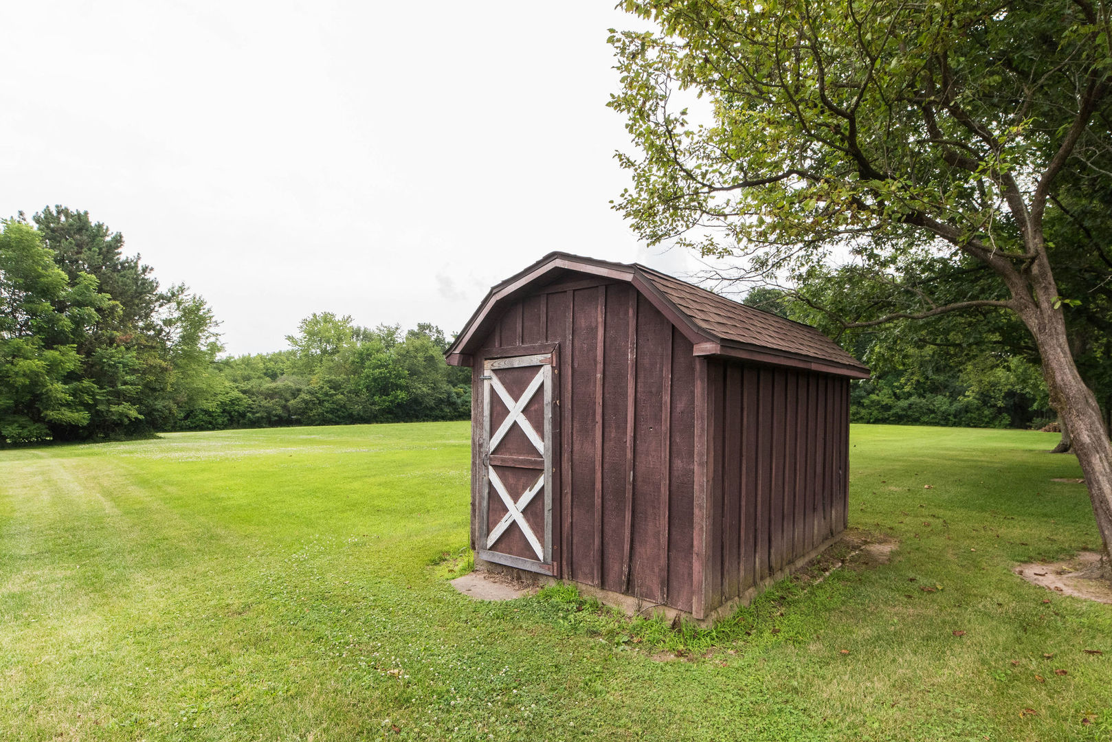 16045 Whipple Road Sycamore, IL 60178 - Photo 47 of 60 a backyard of a house with lots of green space