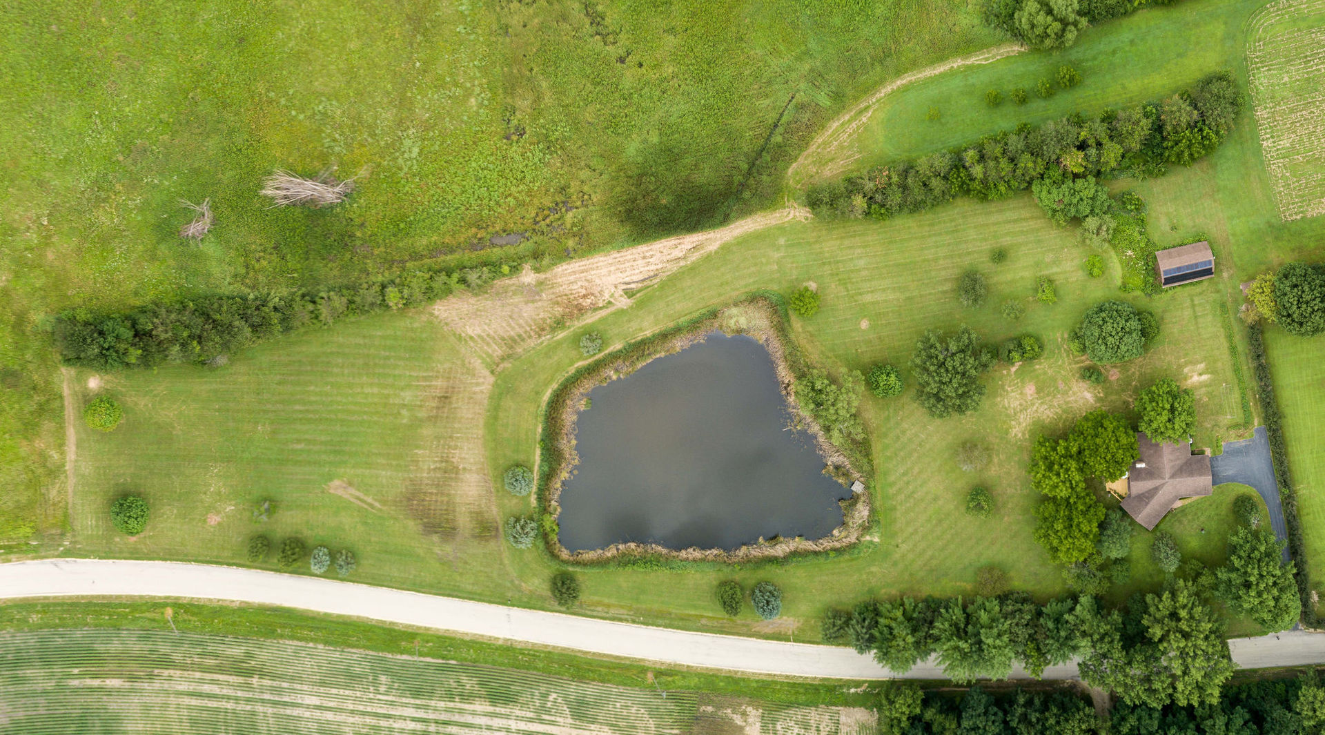 16045 Whipple Road Sycamore, IL 60178 - Photo 53 of 60 a view of swimming pool from a lake view