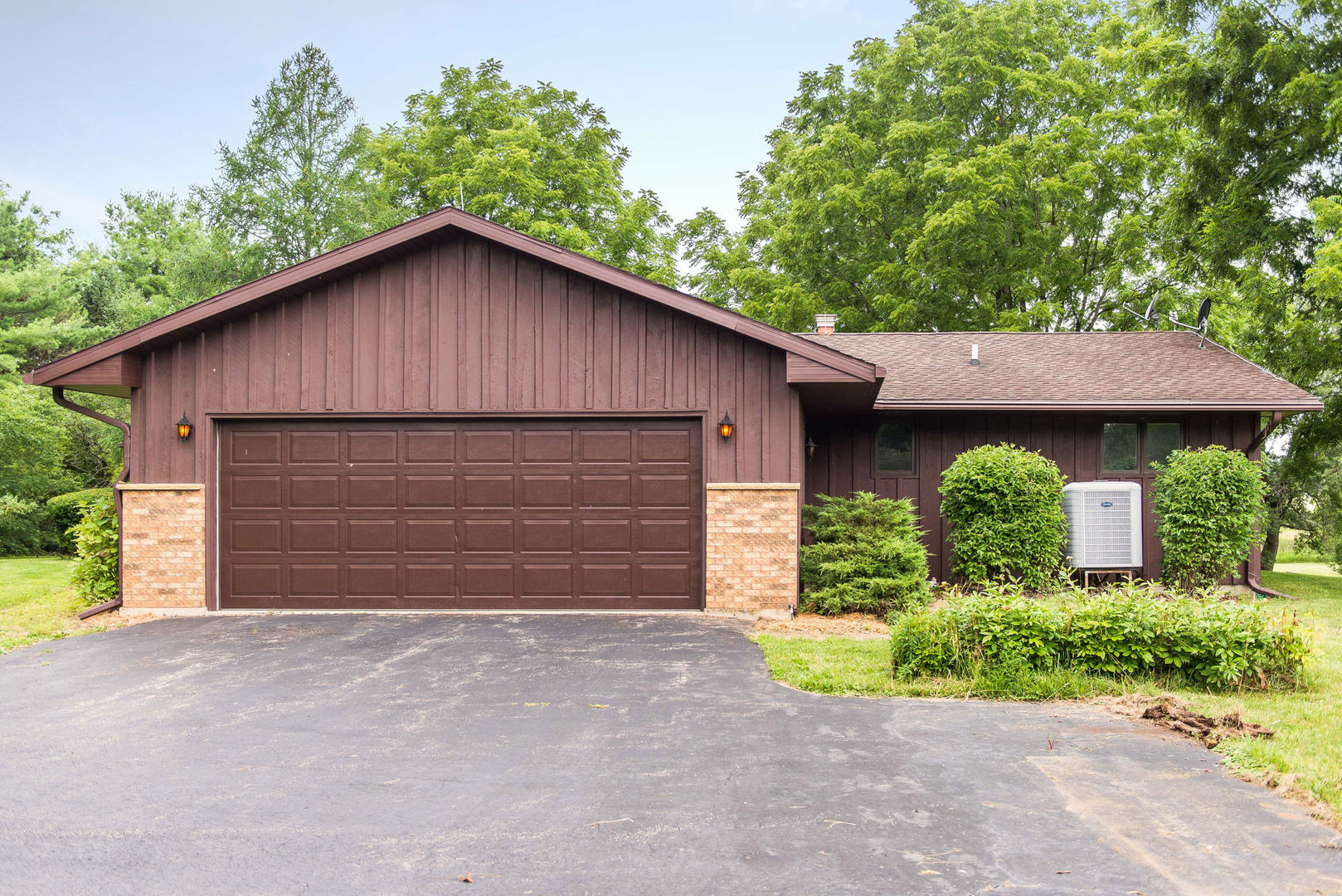 16045 Whipple Road Sycamore, IL 60178 - Photo 60 of 60 a view of a house with a yard and garage