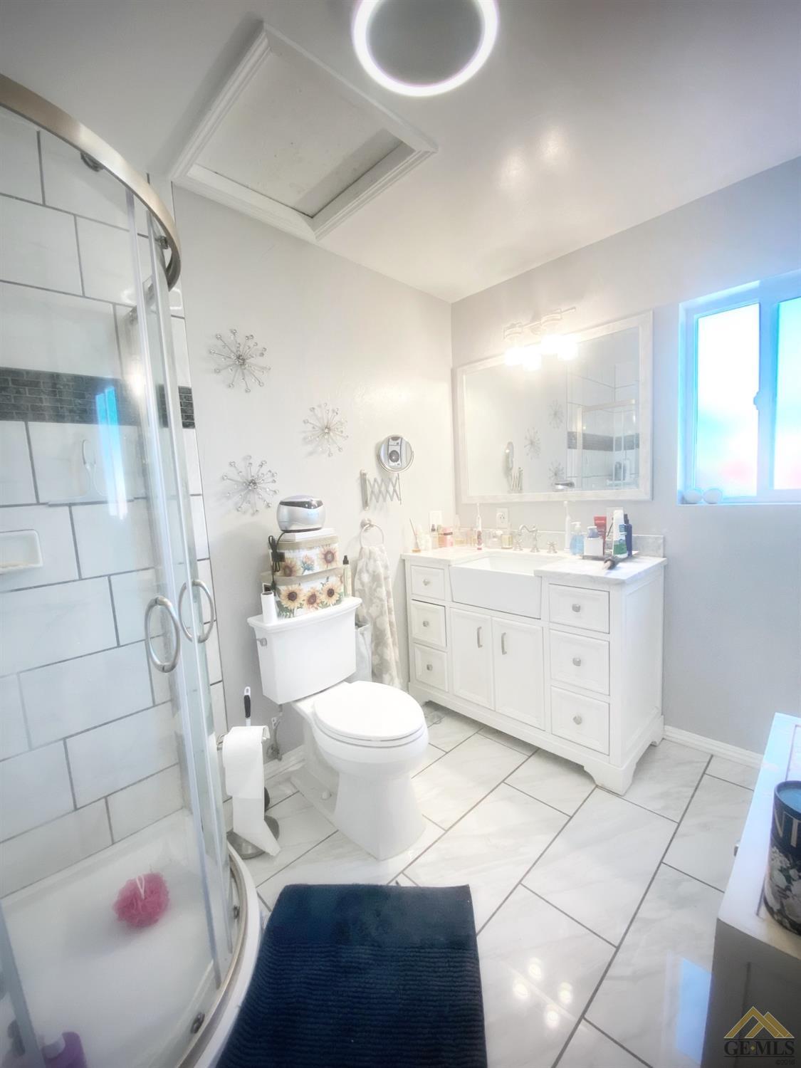 Undisclosed Address Wasco, CA 93280 - Photo 28 of 40 a bathroom with a sink toilet and shower