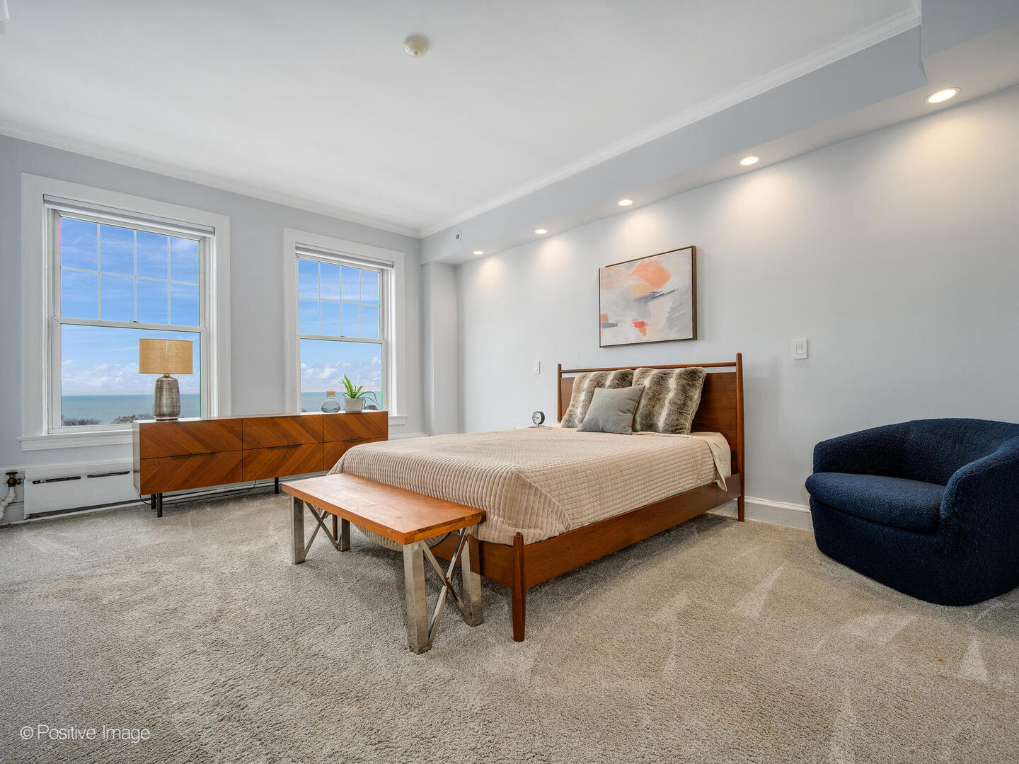 3530 North Lake Shore Drive, Unit 11B Chicago, IL 60657 - Photo 17 of 24 a bedroom with a bed and a couch