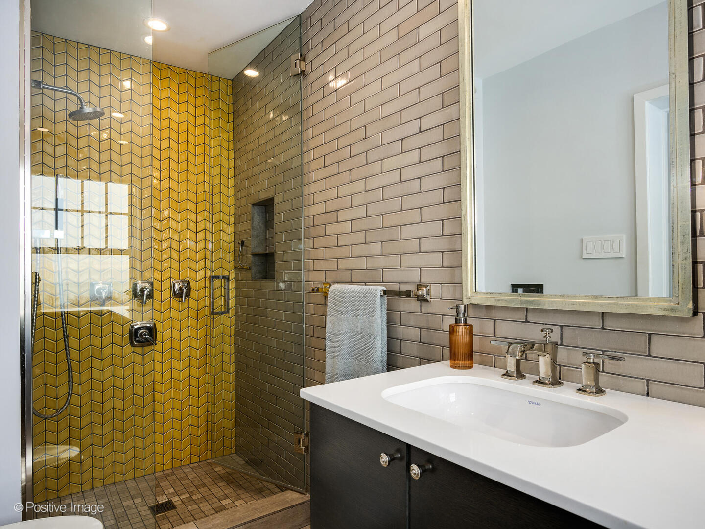 3530 North Lake Shore Drive, Unit 11B Chicago, IL 60657 - Photo 20 of 24 a bathroom with a sink shower and a mirror