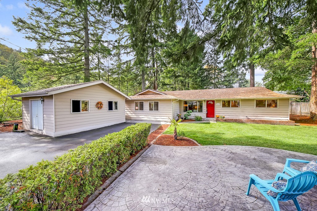 14219 Southeast Allen Rd. Bellevue, WA 98006 - Photo 1 of 1 a front view of house with yard and green space