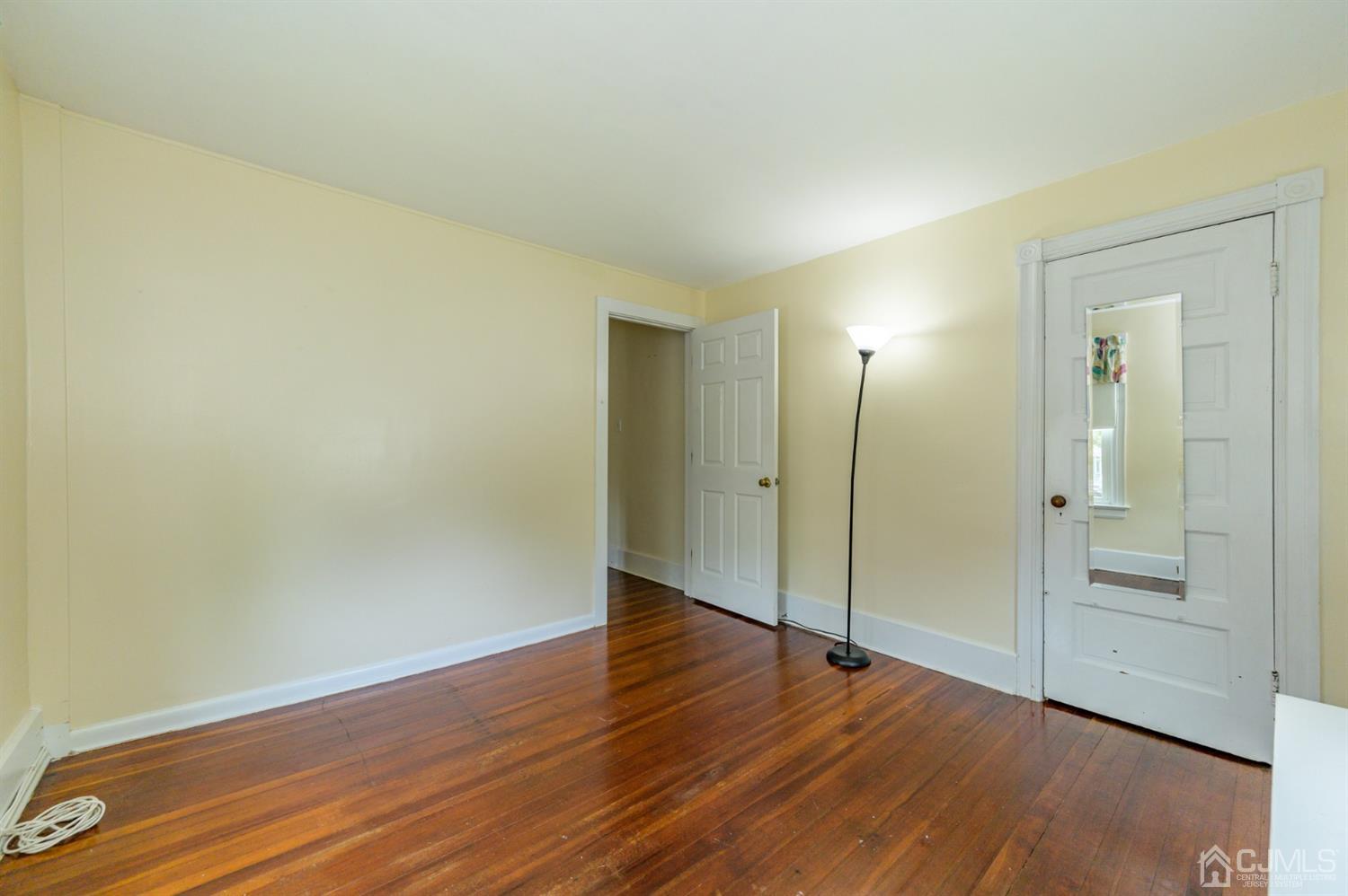 1237 Lower Ferry Road Ewing, NJ 08618 - Photo 15 of 42 wooden floor in an empty room