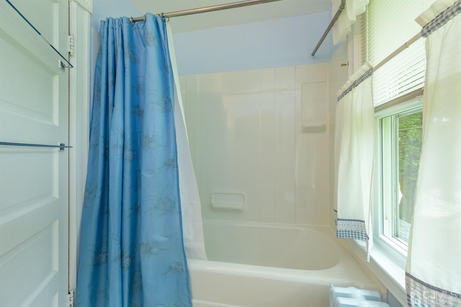 1237 Lower Ferry Road Ewing, NJ 08618 - Photo 19 of 42 a bathroom with bathtub and shower