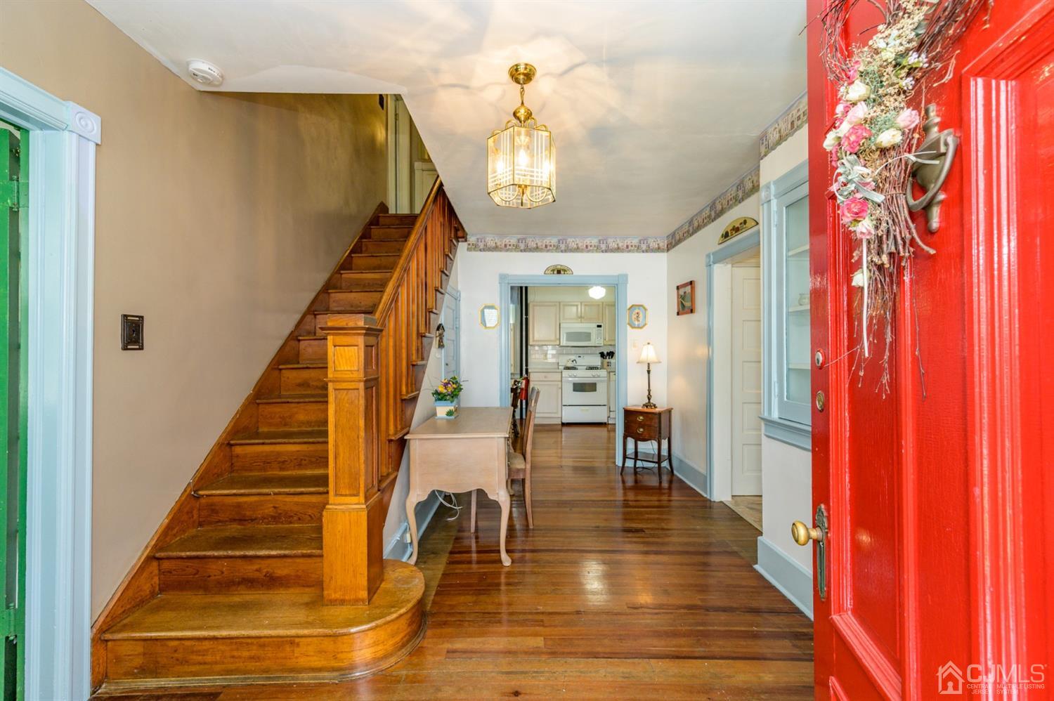 1237 Lower Ferry Road Ewing, NJ 08618 - Photo 3 of 42 a view of entryway and hall with wooden floor
