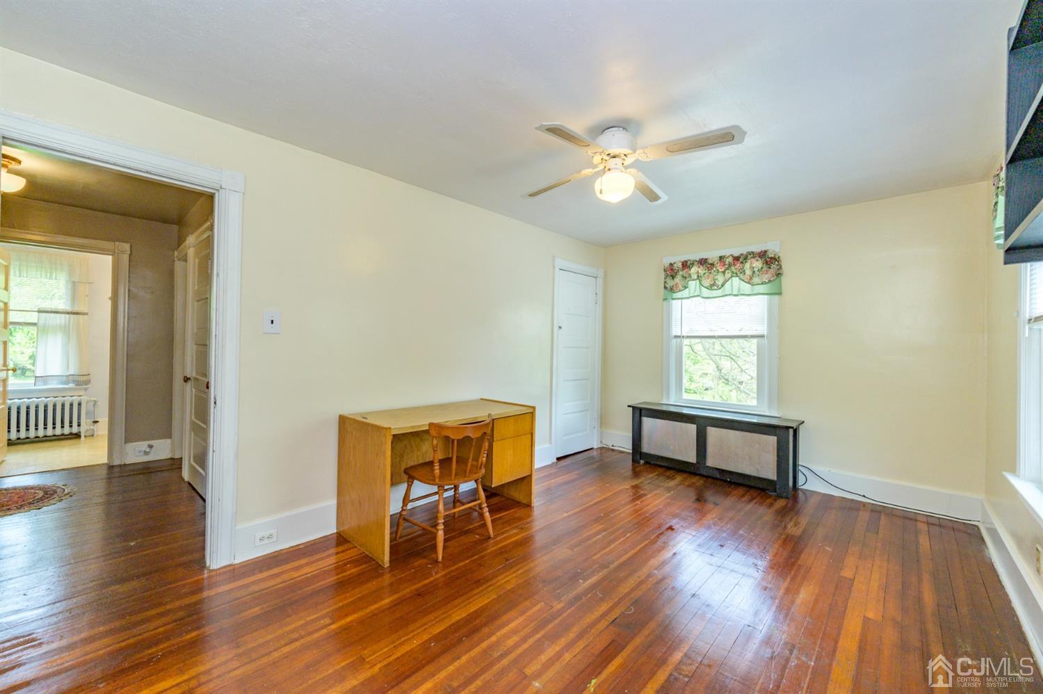1237 Lower Ferry Road Ewing, NJ 08618 - Photo 22 of 42 a view of a livingroom with furniture and wooden floor