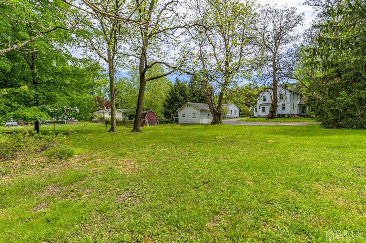 1237 Lower Ferry Road Ewing, NJ 08618 - Photo 29 of 42 a view of a park with large trees