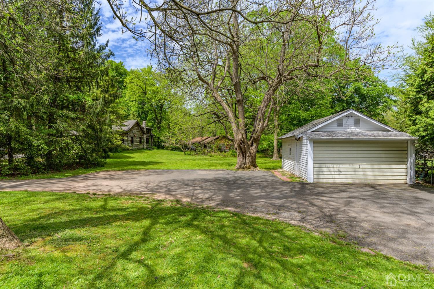 1237 Lower Ferry Road Ewing, NJ 08618 - Photo 32 of 42 a view of a house with a yard