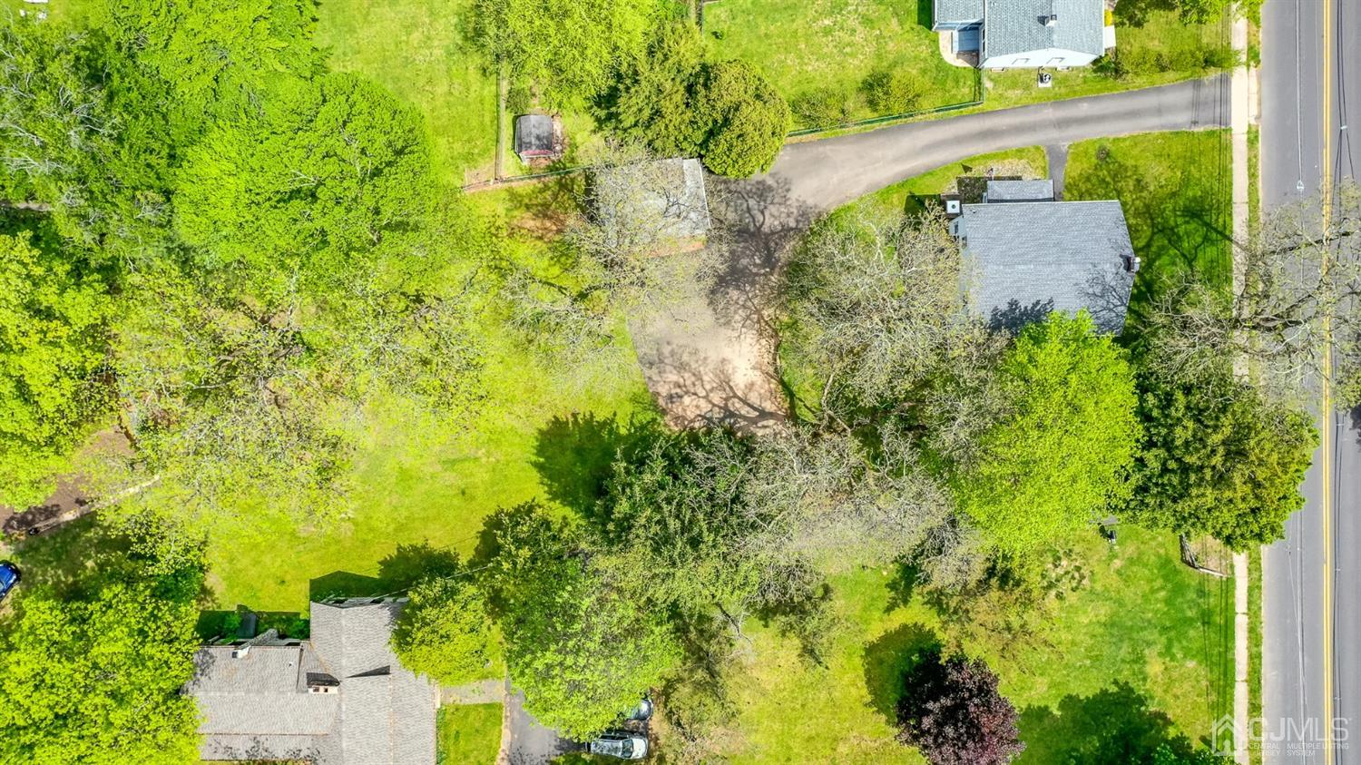 1237 Lower Ferry Road Ewing, NJ 08618 - Photo 37 of 42 an aerial view of a house with a yard