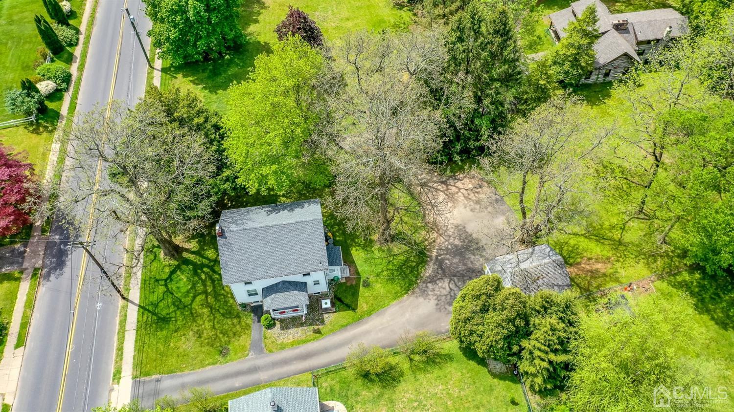 1237 Lower Ferry Road Ewing, NJ 08618 - Photo 38 of 42 an aerial view of residential house with outdoor space and trees all around