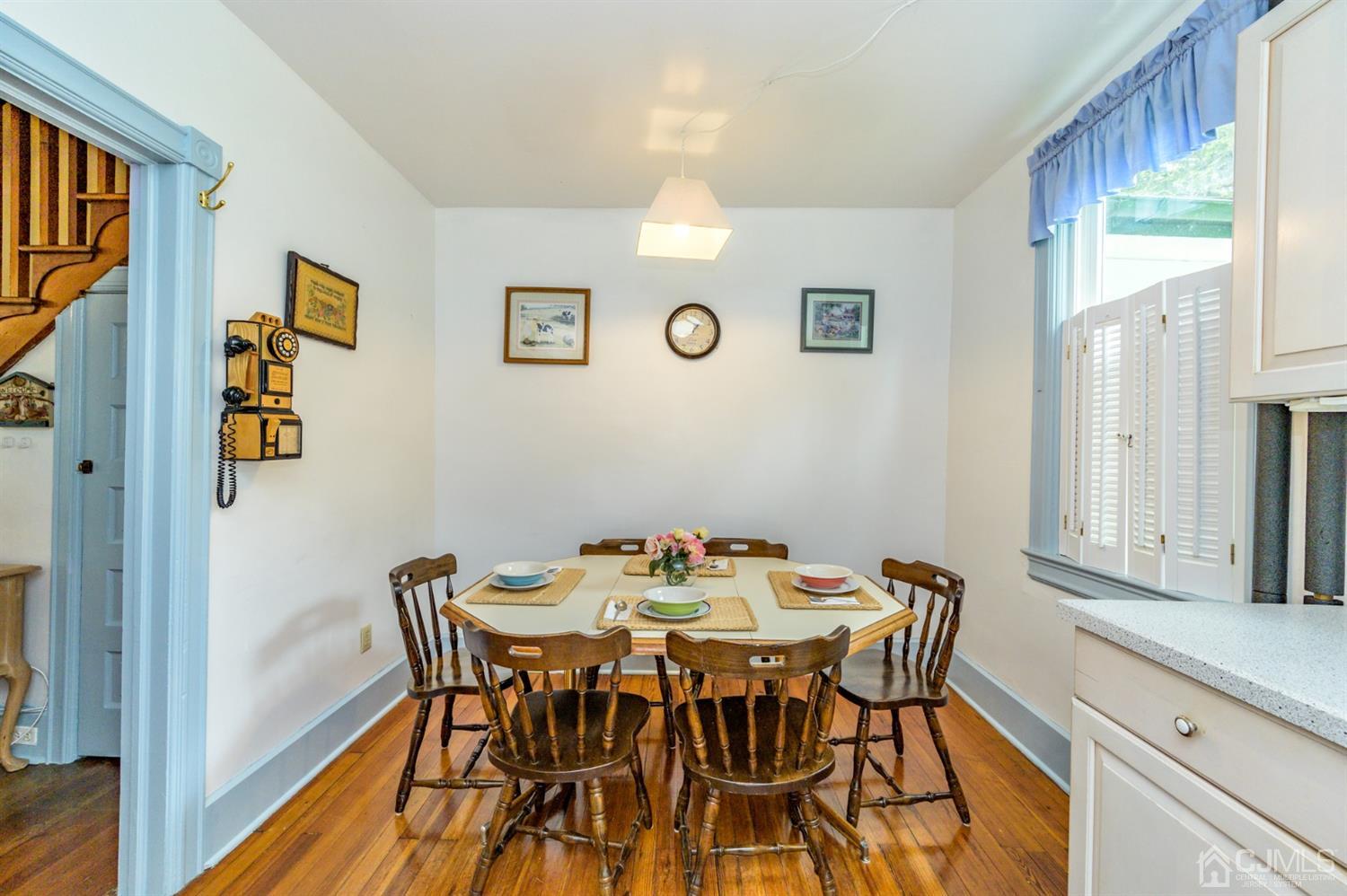 1237 Lower Ferry Road Ewing, NJ 08618 - Photo 5 of 42 a view of a dining room with furniture and a window