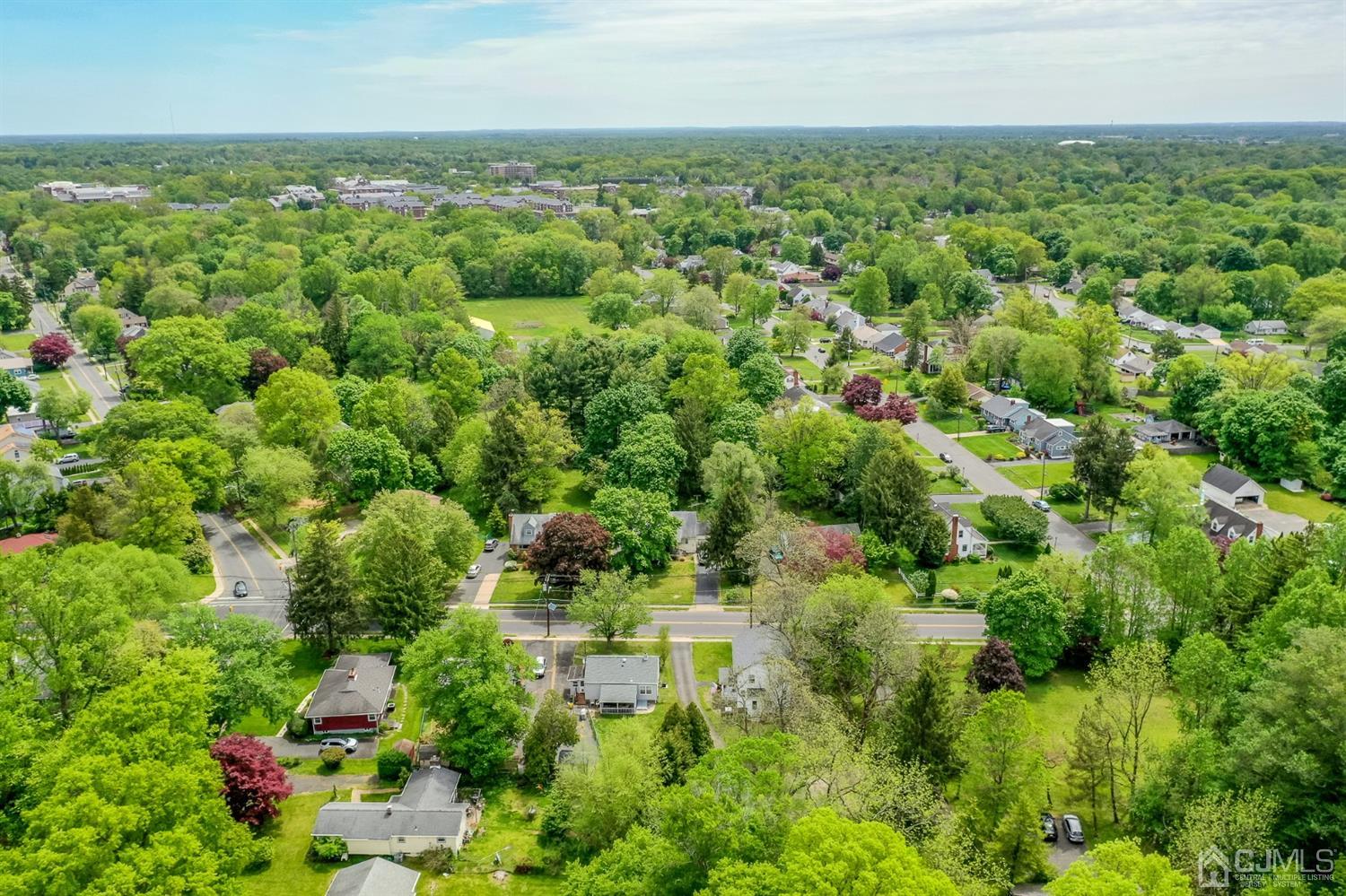 1237 Lower Ferry Road Ewing, NJ 08618 - Photo 41 of 42 an aerial view of residential houses with outdoor space and trees